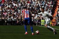 Football Soccer - Real Madrid v Atletico Madrid - Spanish La Liga Santander - Santiago Bernabeu Stadium, Madrid, Spain - 8/04/17 - Real Madrid's Cristiano Ronaldo and Atletico Madrid's Yannick Ferreira-Carrasco in action. REUTERS/Juan Medina