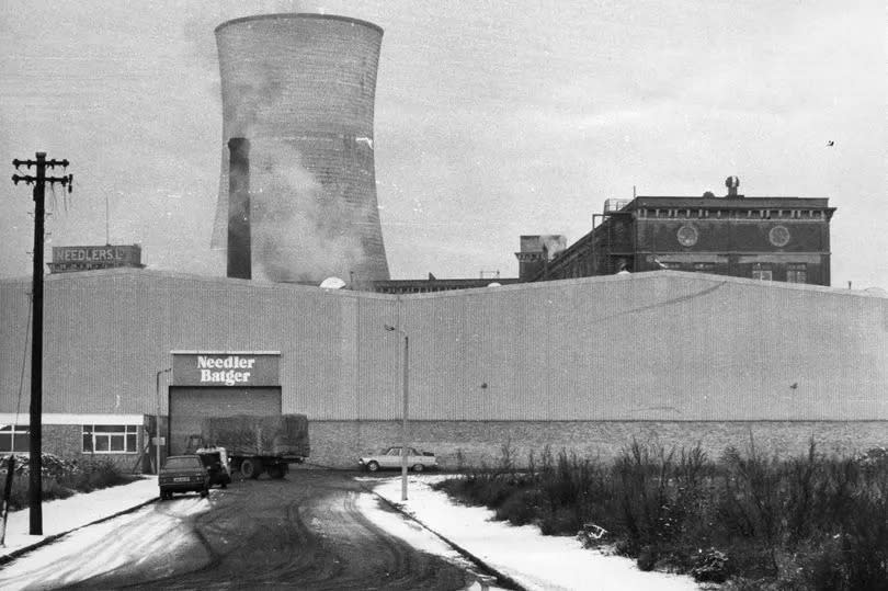 Exterior of Needlers factory, in Air Street, Hull, filed into the library in January 1977, showing the cooling tower for the now gone Sculcoates Power Station in the background