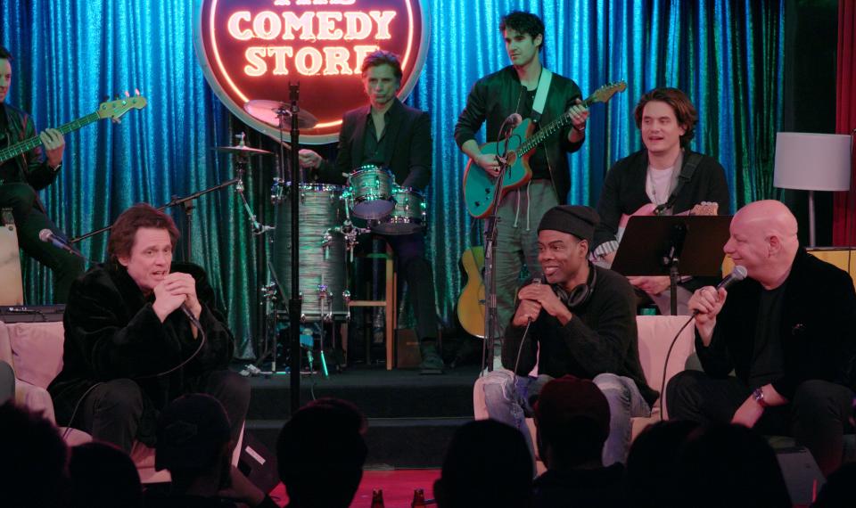 Jim Carrey, far left, John Stamos, Darren Criss, Chris Rock, John Mayer and Jeff Ross gather at The Comedy Store in Los Angeles to remember their dear friend Bob Saget.