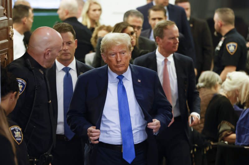 Former United States President Donald Trump exits the courtroom for a break when he testifies in his civil fraud trial at State Supreme Court on Monday, November 6, 2023 in New York City. The case brought last September by New York Attorney General Letitia James, accuses Trump, his eldest sons and his family business of inflating Trump's net worth by more than $2 billion by overvaluing his real estate portfolio. Photo by John Angelillo/UPI
