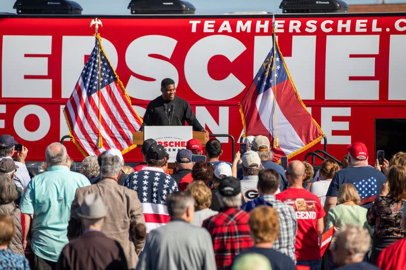 FILE PHOTO: Walker holds a rally ahead of Senate runoff in Georgia