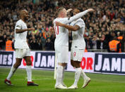 Rooney celebrates with goalscorer Callum Wilson (Nick Potts/PA)