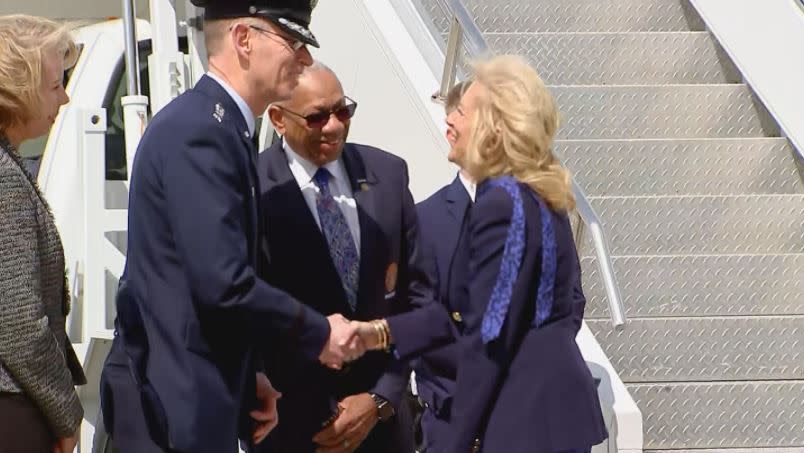 Gen. Duke Z. Richardson, Commander of the Air Force Materiel Command greets First Lady Dr. Jill Biden as she arrives at Wright-Patterson Air Force Base Wednesday. Eric Higgenbotham/Staff