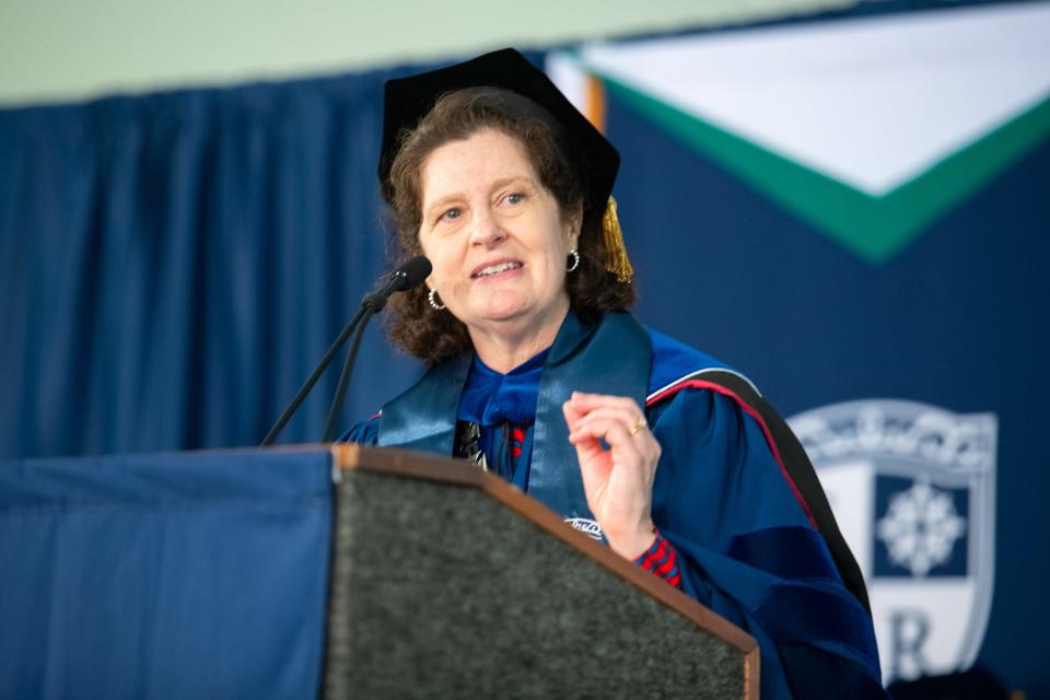 Salve Regina University President Kelli Armstrong addresses graduates during the 74th Commencement in Newport.