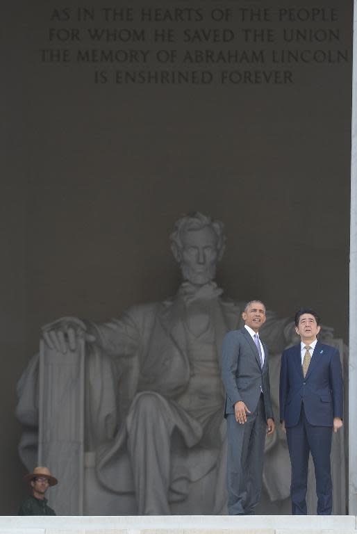 US President Barack Obama accompanies Japan's Prime Minister Shinzo Abe during a visit to Lincoln Memorial on April 27, 2015 in Washington, DC