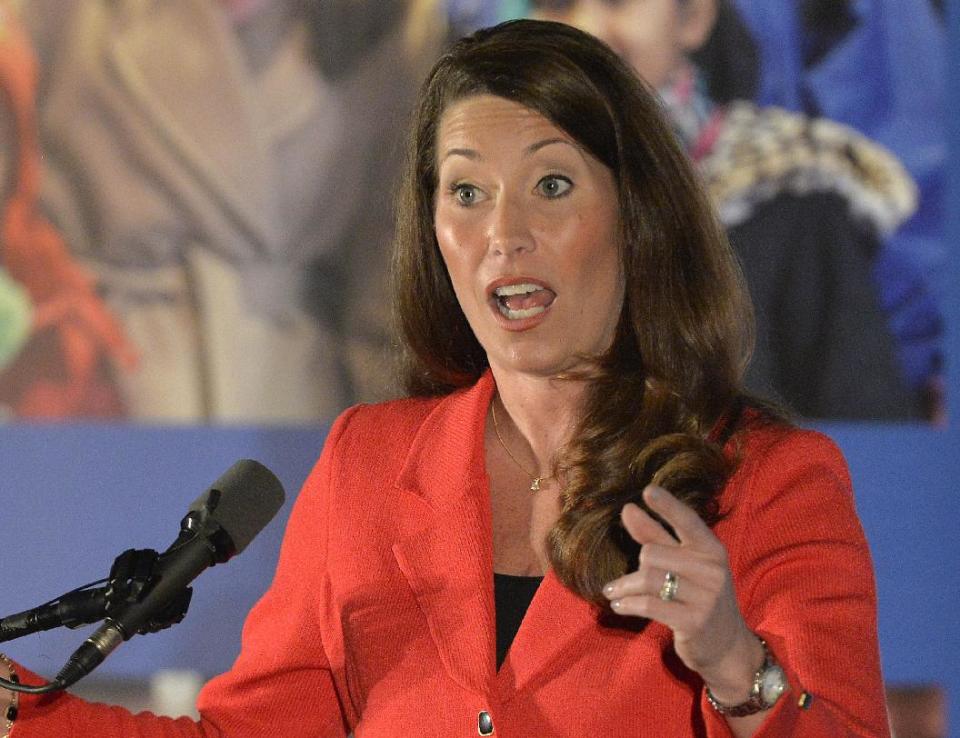 FILE - This Feb. 25, 2014 file photo shows Kentucky Democratic Senate candidate Alison Lundergan Grimes speaking in Louisville, Ky. Deciding which party controls the U.S. Senate for the final two years of President Barack Obama’s tenure could come down to women _ both the handful who are running in significant races and the moderate female voters who often tip close elections. (AP Photo/Timothy D. Easley, File)