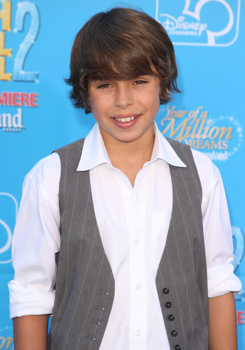 Jake T. Austin smiles at the "High School Musical 2" premiere on August 14, 2007