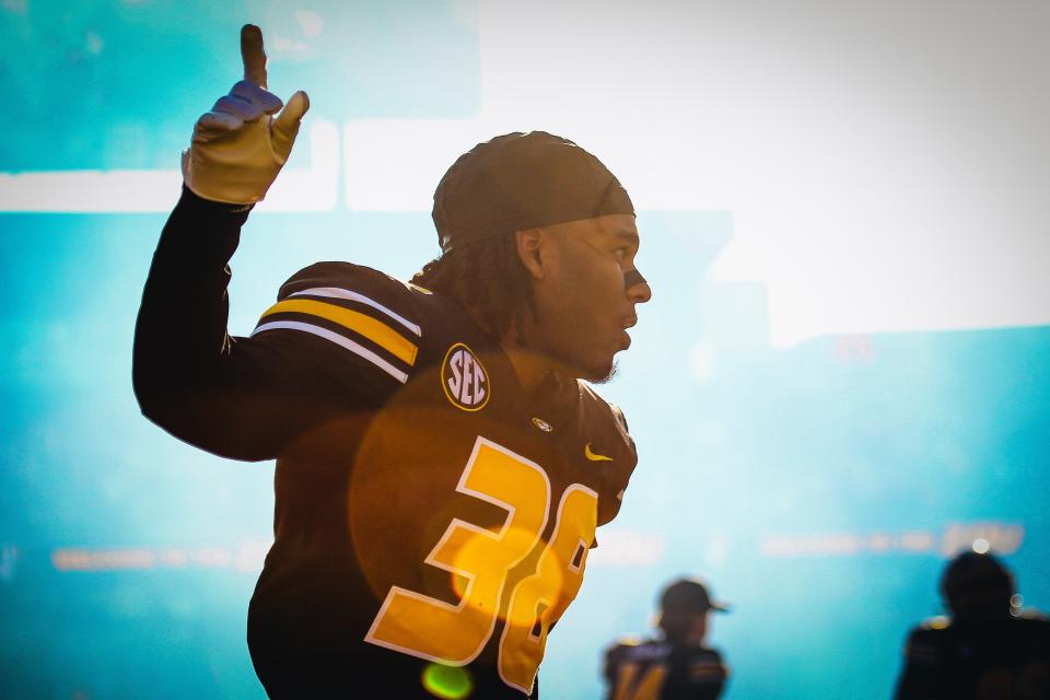 Missouri defensive back Justin Efebera (38) points to the crowd before a game against Arkansas on Nov. 25, 2022, after running onto the field in Columbia, Mo.