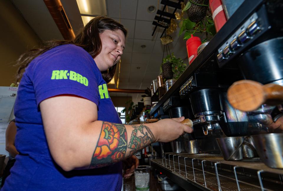 Lizeth Zorrilla-Sanchez, owner of La Finca Coffeehouse, prepares coffee for a customer on Tuesday July 16, 2024 in Milwaukee, Wis.