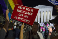 <p>A demonstrator sign as protesters gather in front of the Supreme Court in Washington, Monday, July 9, 2018, after President Donald Trump announced Judge Brett Kavanaugh as his Supreme Court nominee. (Photo: Cliff Owen/AP) </p>