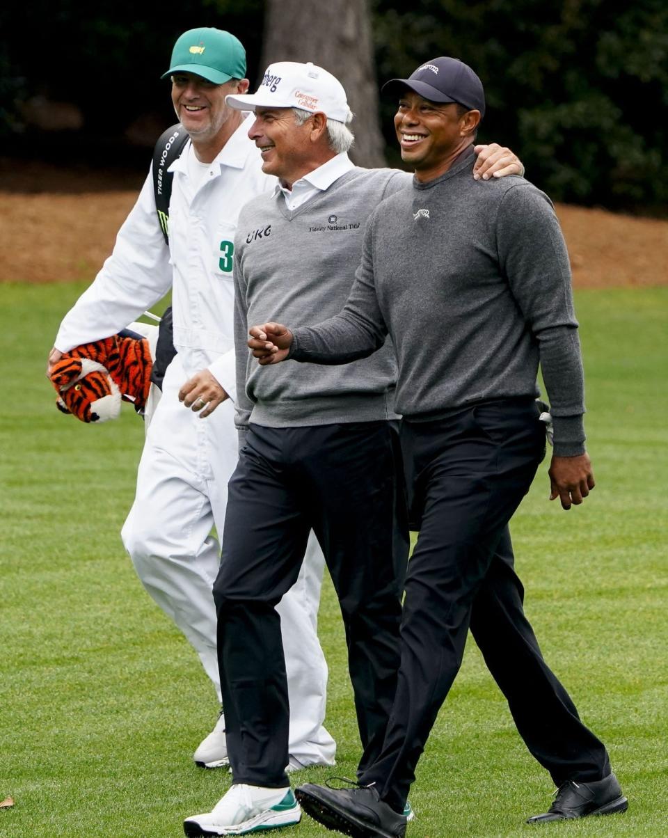 Apr 9, 2024; Augusta, Georgia, USA; Fred Couples walks the no. 5 fairway with Tiger Woods during a practice round for the Masters Tournament golf tournament at Augusta National Golf Club. Mandatory Credit: Katie Goodale-USA TODAY Network