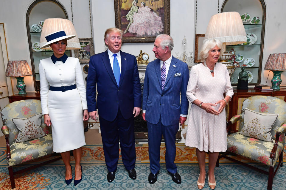 LONDON, ENGLAND - JUNE 03: U.S. President Donald Trump (2nd L) and his wife Melania Trump (L)  take tea with Prince Charles, Prince of Wales (2nd R) and Camilla, Duchess of Cornwall (R) at Clarence House on June 3, 2019 in London, England. President Trump's three-day state visit will include lunch with the Queen, and a State Banquet at Buckingham Palace, as well as business meetings with the Prime Minister and the Duke of York, before travelling to Portsmouth to mark the 75th anniversary of the D-Day landings.  (Photo by Victoria Jones - WPA Pool/Getty Images)