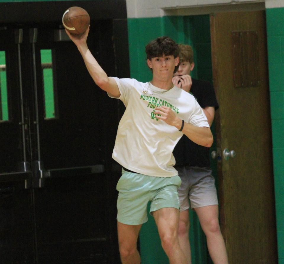 Newark Catholic's Miller Hutchison throws a pass during Thursday's Licking County college football scouting combine.