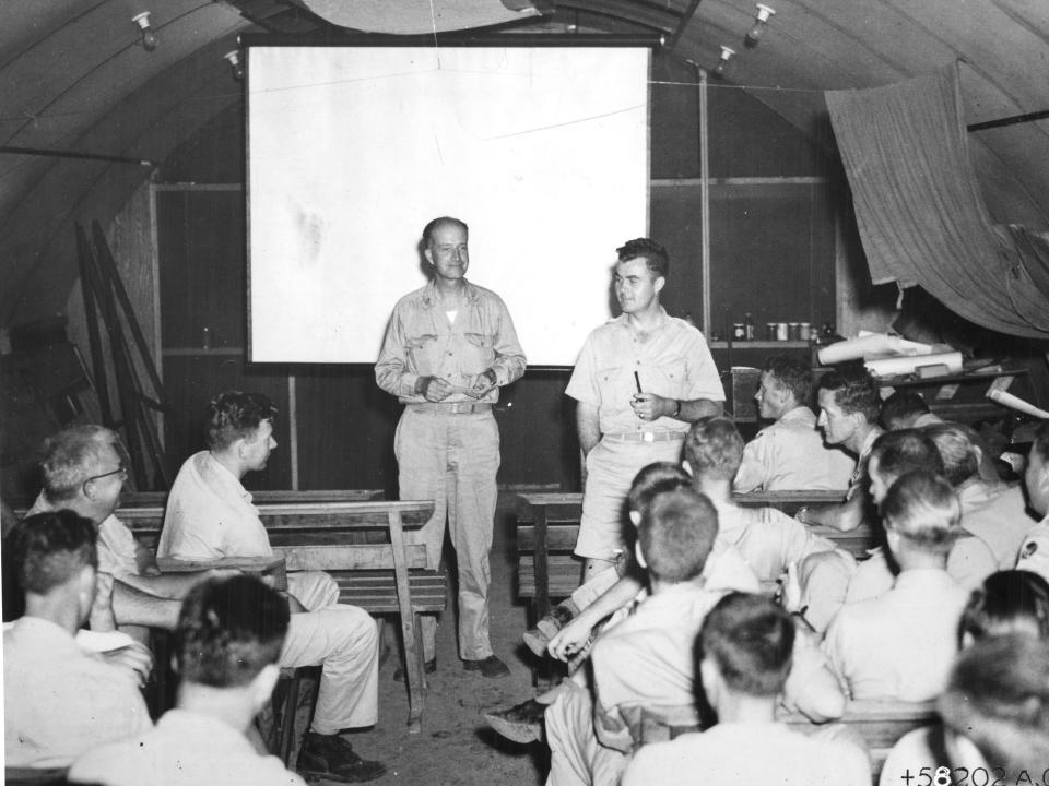 A briefing held on August 5 led by Captain William Parsons and Colonel Paul Tibbets.