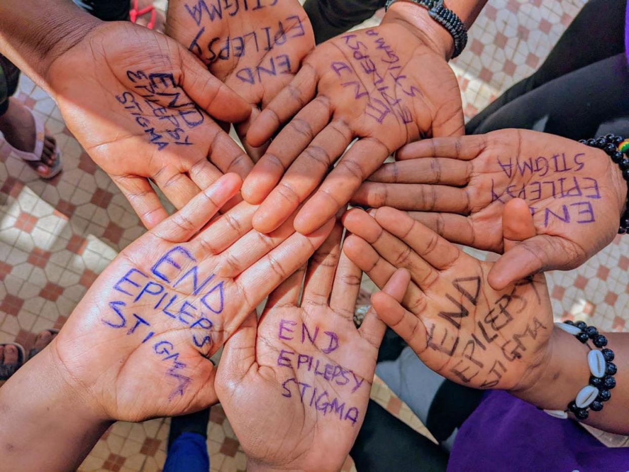 <span>Patients lend a hand to get the anti-stigma message across in a country with one of the highest global rates of epilepsy.</span><span>Photograph: Courtesy of Dr Noelar</span>