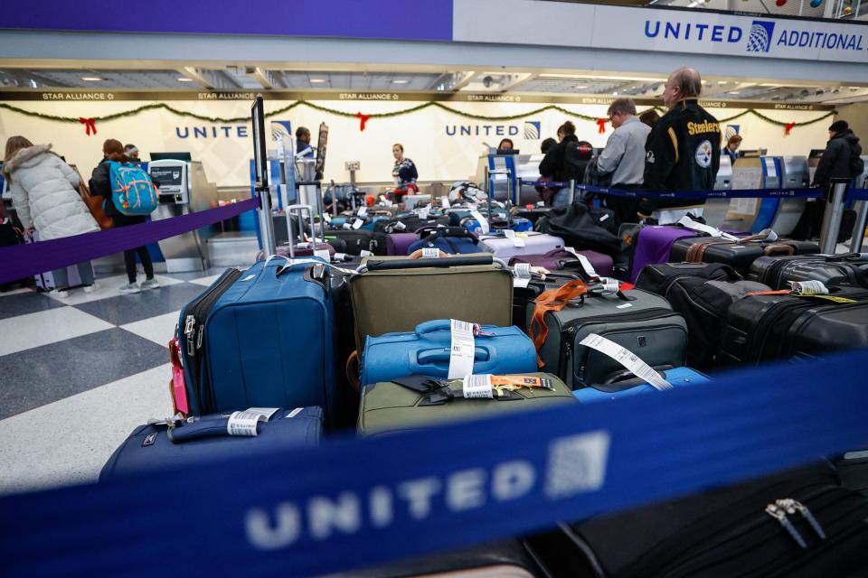 Dropped luggage sits at the United Airlines Terminal 1 ahead of the Christmas Holiday at O'Hare International Airport on December 22, 2022, in Chicago.