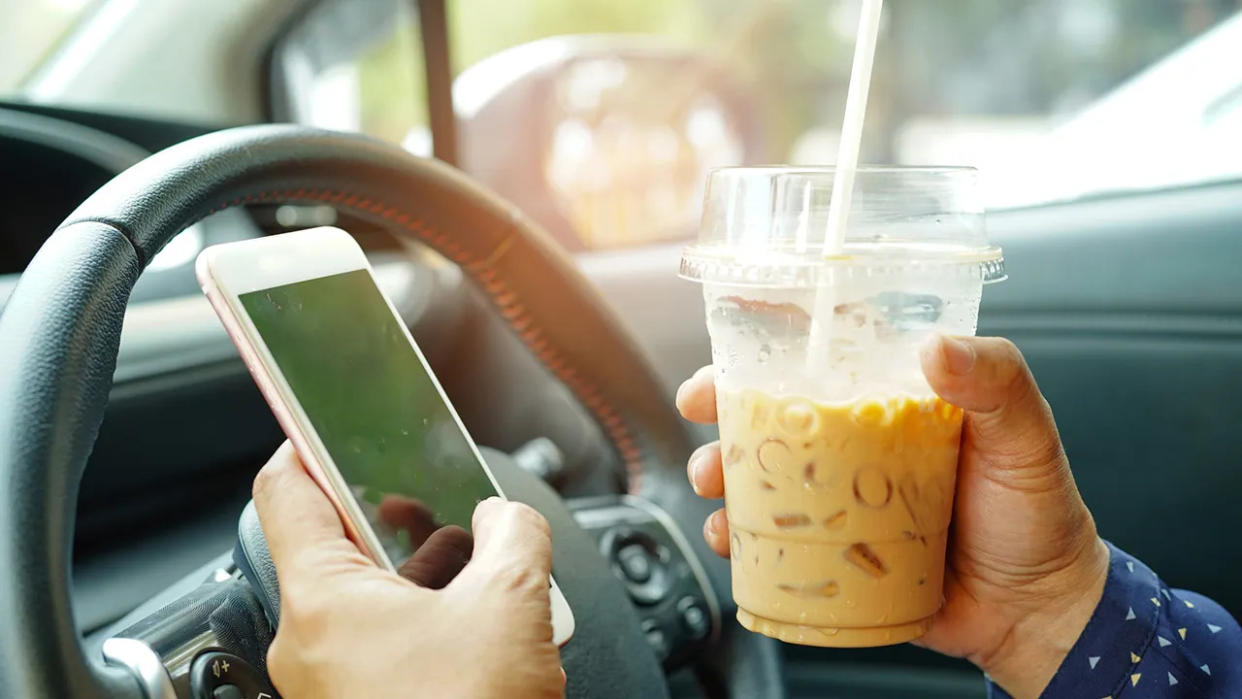 Eating and drinking while driving is one of the primary causes of distracted driving, experts agreed.