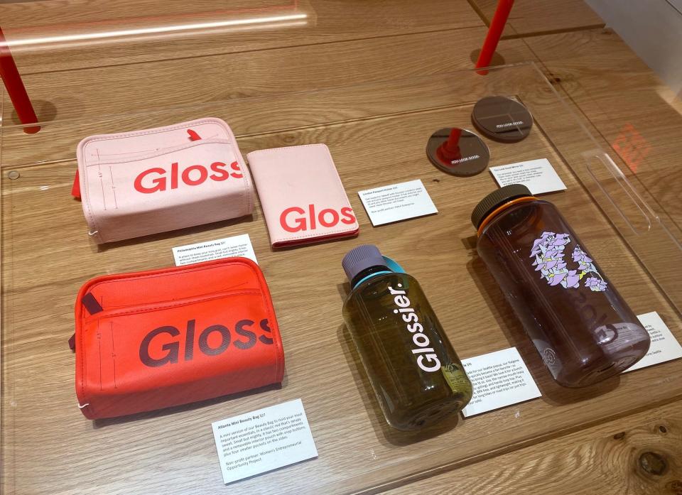 Exclusive merchandise items that are available to buy at the Glossier flagship store.