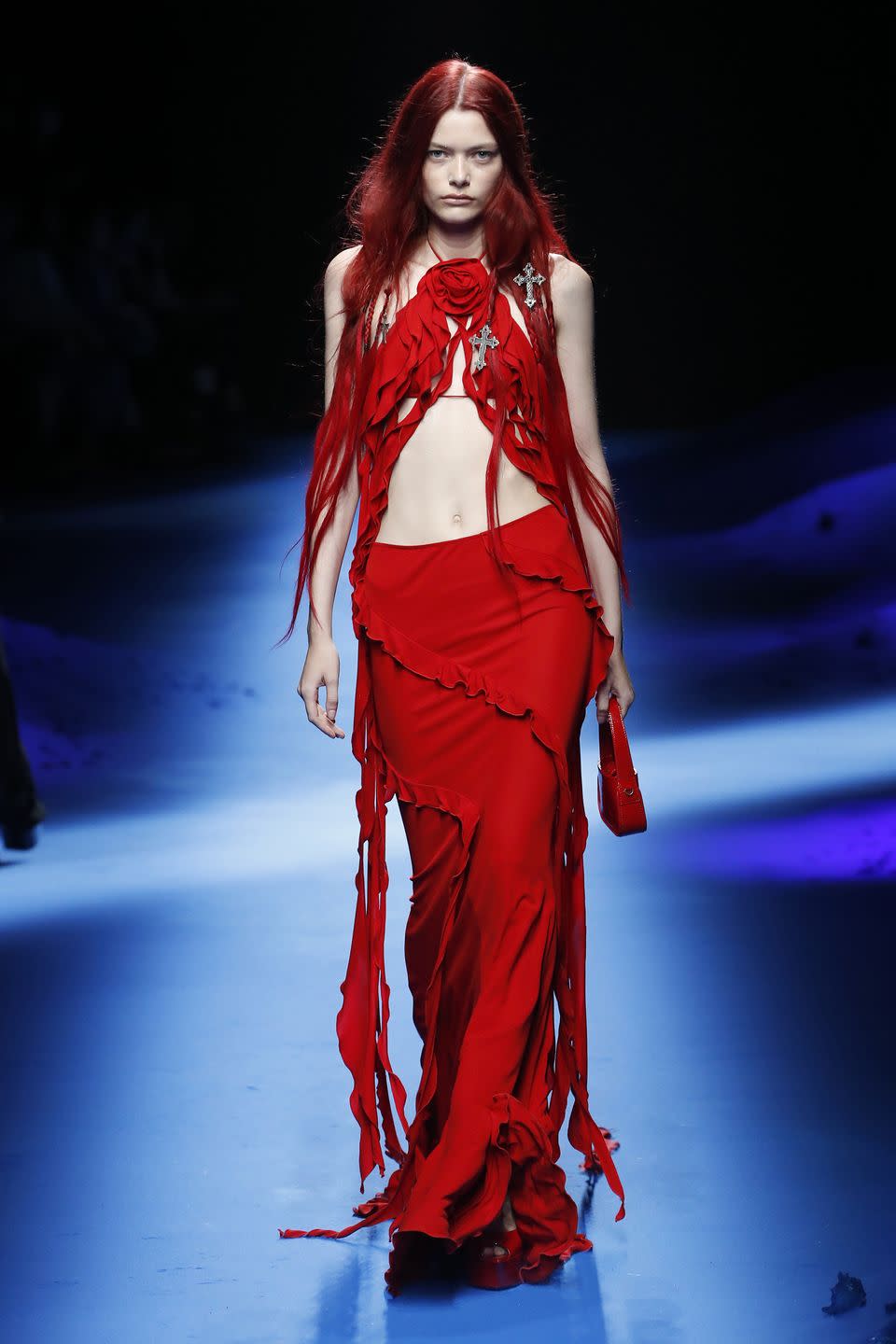 <p>No one does sexy quite like Blumarine—but this time around, the label is wading into deeper waters with a collection inspired by mermaids. But rather than leaning into the girly aesthetic we often see from the label, Blumarine puts out the siren song that is its spring 2023 collection. Think: ultra-flared, dark-wash denim, romantic draping, billowing trains, and endless ruffles that bring soft jellyfish to mind—oh, and there was also plenty of mesh and loose knits, too. One of our favorite details? The metal shell-shaped bras that have us thinking about if <em>The Little Mermaid</em>’s Ariel went goth.<em>—Dale Chong, senior fashion commerce editor</em></p>
