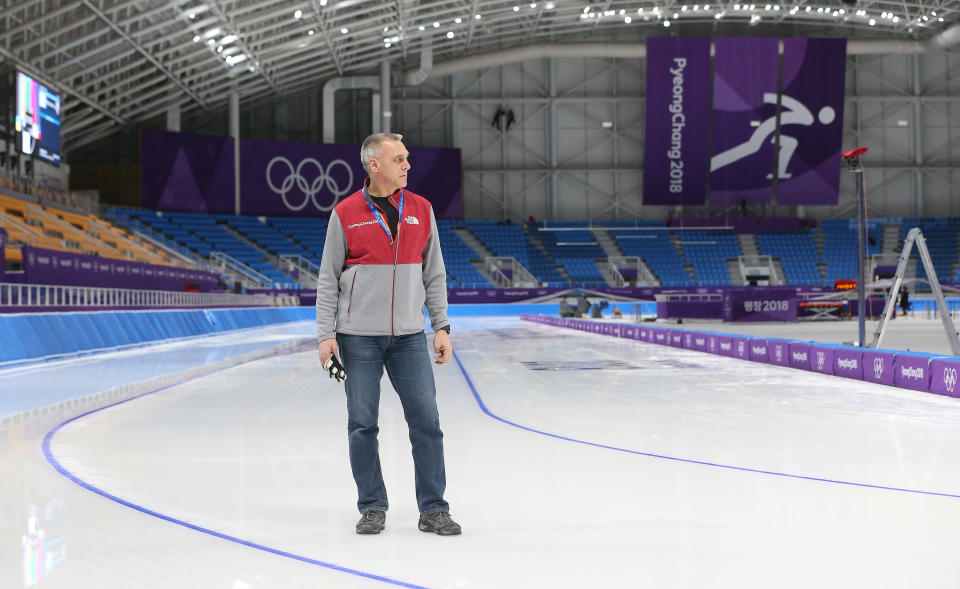 Calgary's Mark Messer (pictured) taking a photo on the ice at the Olympics.