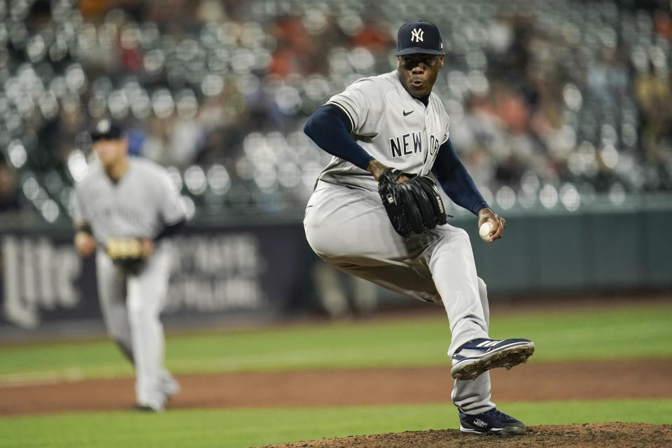 New York Yankees relief pitcher Aroldis Chapman throws a pitch to the Baltimore Orioles during the ninth inning of a baseball game, Tuesday, Sept. 14, 2021, in Baltimore. (AP Photo/Julio Cortez)