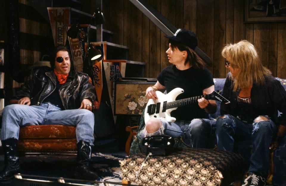 SATURDAY NIGHT LIVE -- Episode 1 -- Pictured: (l-r) Bruce Willis as Rick, Mike Myers as Wayne Campbell, Dana Carvey as Garth Algar during the 'Wayne's World' skit on September 30, 1989 -- Photo by: NBC/NBCU Photo Bank