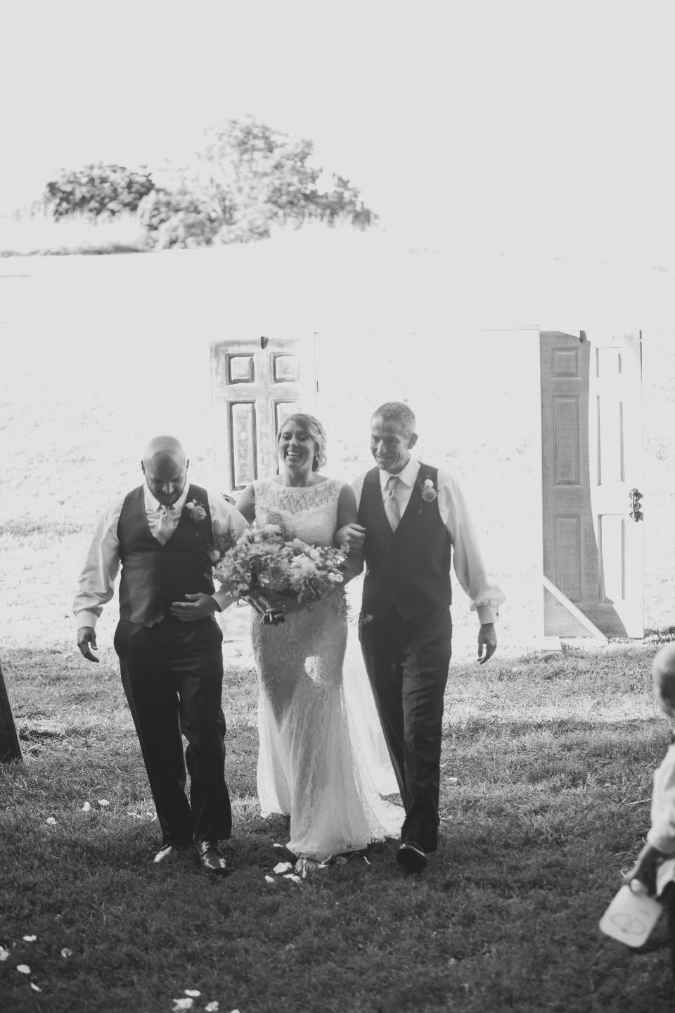 Bride Bailey Baker's&nbsp;dad and stepdad walked her down the aisle.&nbsp; (Photo: <a href="http://www.amberlowephoto.com/" target="_blank">Amber Lowe Photo</a>)