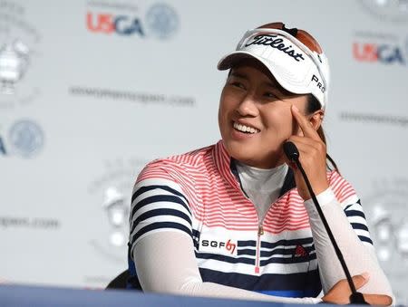 Jun 21, 2014; Pinehurst, NC, USA; Amy Yang responds to interview queststions after the third round of the U.S. Women's Open at the Pinehurst Resort and Country Club-#2 Course. Mandatory Credit: Rob Kinnan-USA TODAY Sports