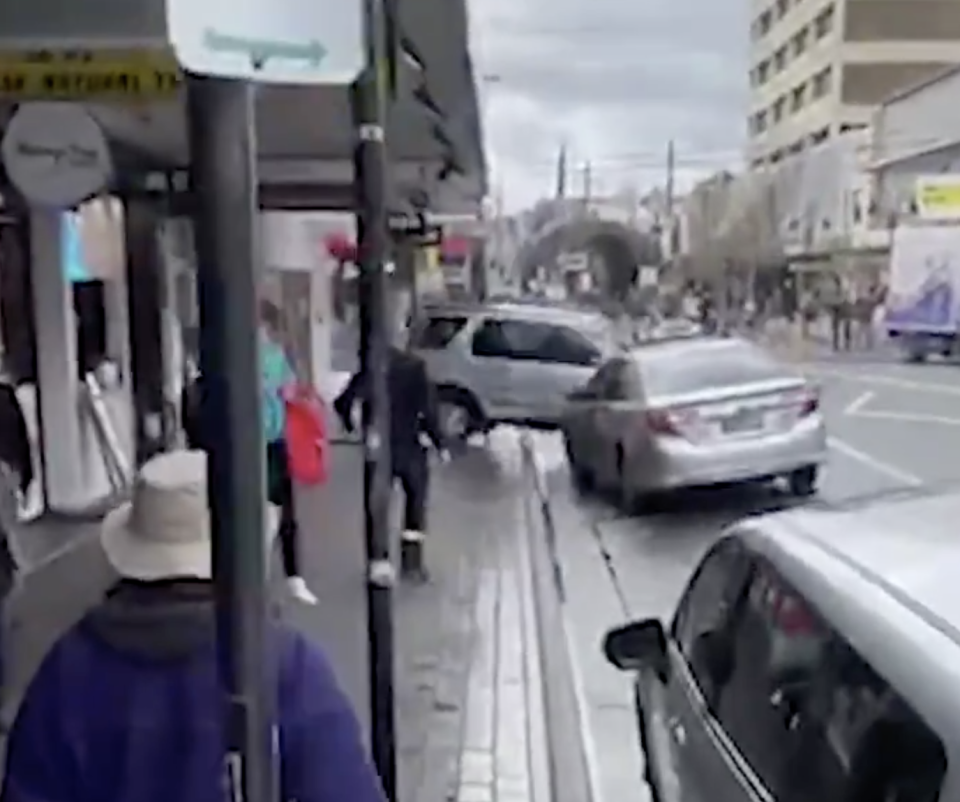 Footage captured the Honda slam up the curb and into the shop. Source: Twitter/Nine News