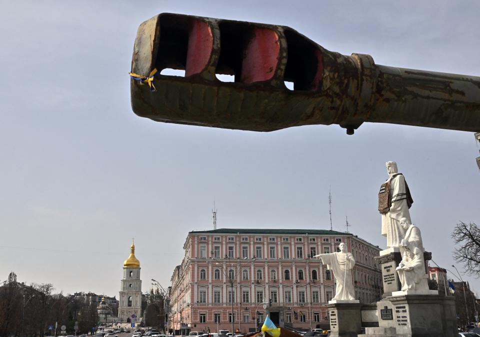 This photograph taken at an open-air exhibition of destroyed Russian armoured vehicles shows the Princess Olga monument dressed in a symbolic bulletproof vest and view of in Kyiv on March 28, 2024, amid the Russian invasion of Ukraine. (Photo by Sergei SUPINSKY / AFP) (Photo by SERGEI SUPINSKY/AFP via Getty Images) ORIG FILE ID: 2113282410