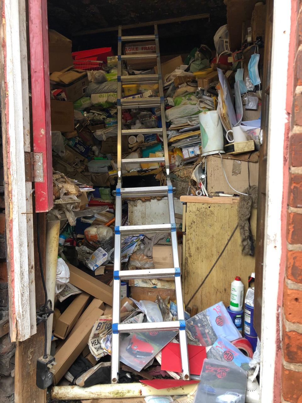 Trying to get into the back door

TRIANGLE NEWS 0208 629 3622 // news@trianglenews.co.uk

By Emily Hall

Vid and pics

CLEANERS sent in to tackle a hoarderâ€™s house stuffed to the rafters with junk were horrified when they discovered the bodies of several mummified CATS amid the rubbish.

The case in Lancashire was one of the worst that professional cleaners had ever seen.

They needed a ladder to climb through a second storey window as piles of trash were blocking all other entrances, with teams at first barely able to enter the unkempt property.

*TRIANGLE NEWS DOES NOT CLAIM ANY COPYRIGHT OR LICENCE IN THE ATTACHED MATERIAL. ANY DOWNLOADING FEES CHARGED BY TRIANGLE NEWS ARE FOR TRIANGLE NEWS SERVICES ONLY, AND DO NOT, NOR ARE THEY INTENDED TO, CONVEY TO THE USER ANY COPYRIGHT OR LICENSE IN THE MATERIAL. BY PUBLISHING THIS MATERIAL , THE USER EXPRESSLY AGREES TO INDEMNIFY AND TO HOLD TRIANGLE NEWS HARMLESS FROM ANY CLAIMS, DEMANDS, OR CAUSES OF ACTION ARISING OUT OF OR CONNECTED IN ANY WAY WITH USER'S PUBLICATION OF THE MATERIAL*

