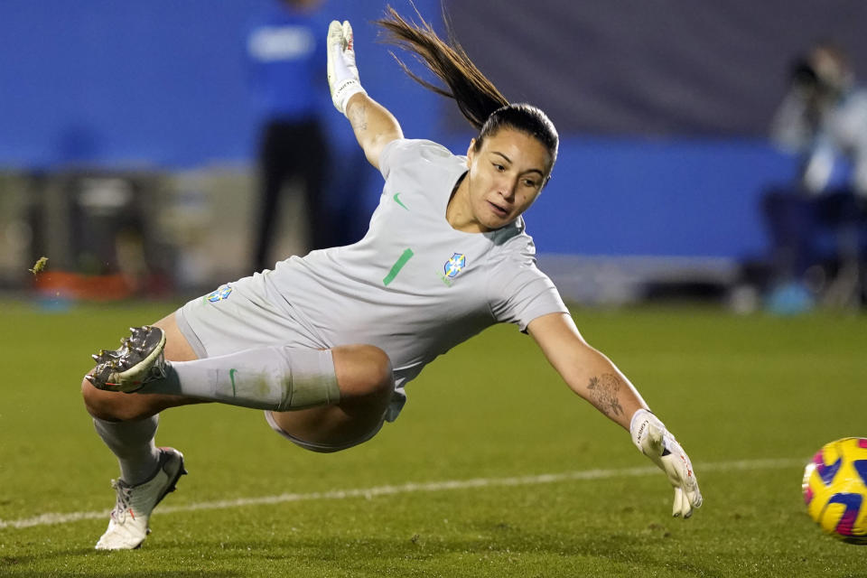 Brazil goalkeeper Lorena alows a goal by United States forward Mallory Swanson during the second half of a SheBelieves Cup soccer match Wednesday, Feb. 22, 2023, in Frisco, Texas. The United States won 2-0. (AP Photo/LM Otero)