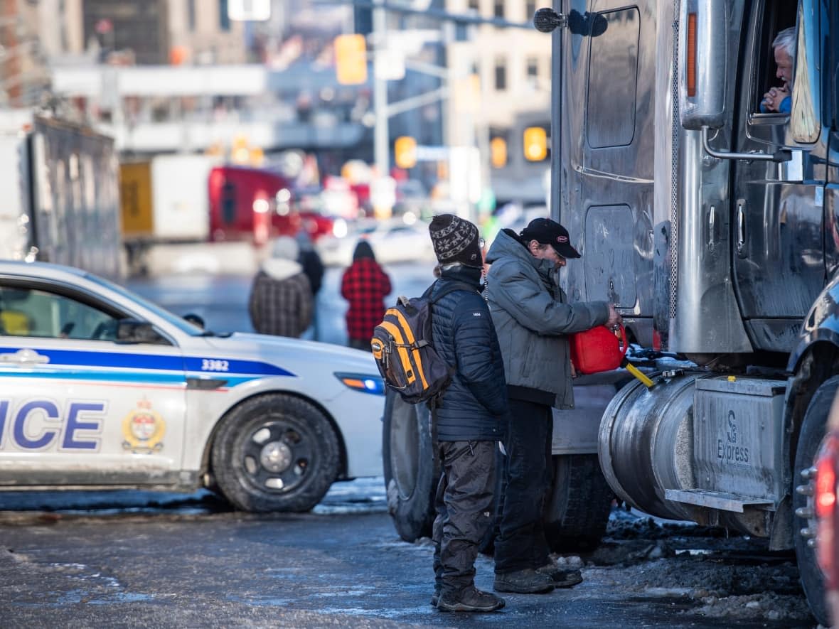 Protesters and their big trucks are now in their 15th day of demonstrating in downtown Ottawa. (Justin Tang/The Canadian Press - image credit)