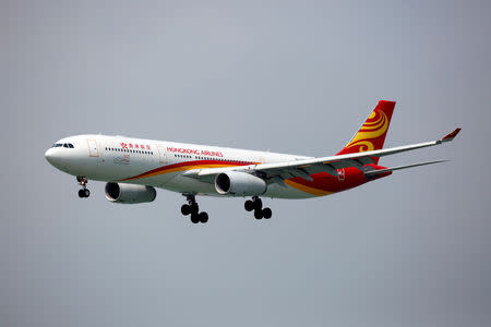 FILE PHOTO: A Hong Kong Airlines Airbus A330-343 descends before landing at Hong Kong Airport in Hong Kong, China, April 4, 2018. REUTERS/Bobby Yip