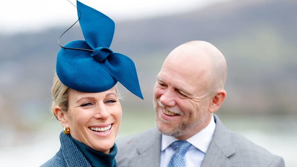 Mike and Zara Tindall smiling at Cheltenham Festival