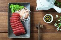 <p>This fatty fish serves up more than heart-healthy omega-3 fatty acids. A 3-ounce serving of raw tuna has 20 grams of protein, and one can of cooked tuna has a whopping 33 grams of protein. Either way, this tasty fish should be top of mind for restaurant ordering or pantry stocking. </p><p><strong>Power up your protein: </strong>Try your hand at making this <a rel="nofollow noopener" href="http://capefearnutrition.com/2015/07/10/sizzling-summertime-sandwich-tuna-burger-with-wasabi-slaw/" target="_blank" data-ylk="slk:tuna burger with wasabi slaw;elm:context_link;itc:0;sec:content-canvas" class="link ">tuna burger with wasabi slaw</a> from Cape Fear Nutrition at home, or even better, <a rel="nofollow noopener" href="https://www.prevention.com/food-nutrition/recipes/a20526747/grilled-tuna-and-eggs-benedict/" target="_blank" data-ylk="slk:pair your tuna with eggs;elm:context_link;itc:0;sec:content-canvas" class="link ">pair your tuna with eggs</a> for our twist on the classic benedict.</p>
