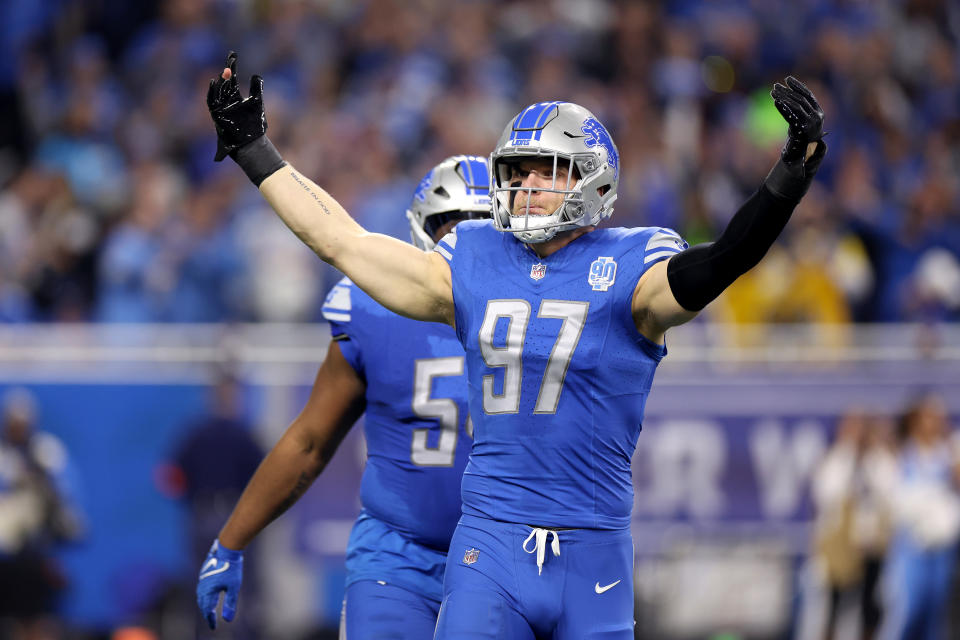 DETROIT, MICHIGAN – JANUARY 14: Aidan Hutchinson #97 of the Detroit Lions reacts after a sack during the first quarter against the Los Angeles Rams in the NFC Wild Card Playoffs at Ford Field on January 14, 2024 in Detroit, Michigan. (Photo by Gregory Shamus/Getty Images)