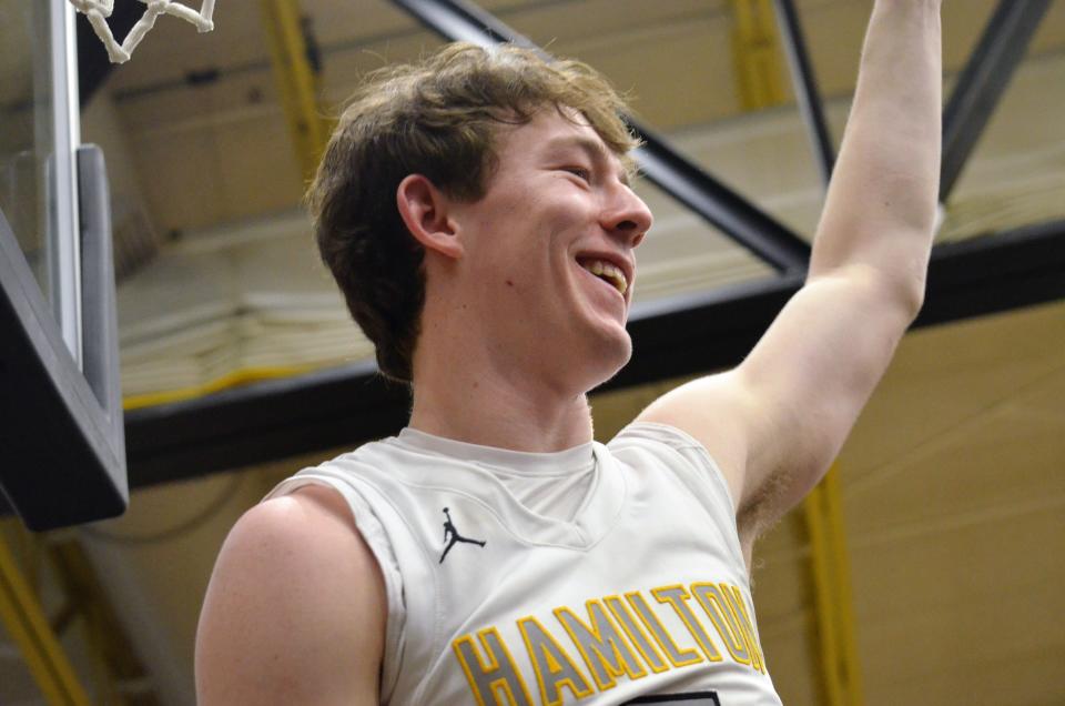 Hamilton's Brant Goodpaster celebrates after the Hawkeyes won their first district title since 1987 on Friday at home.