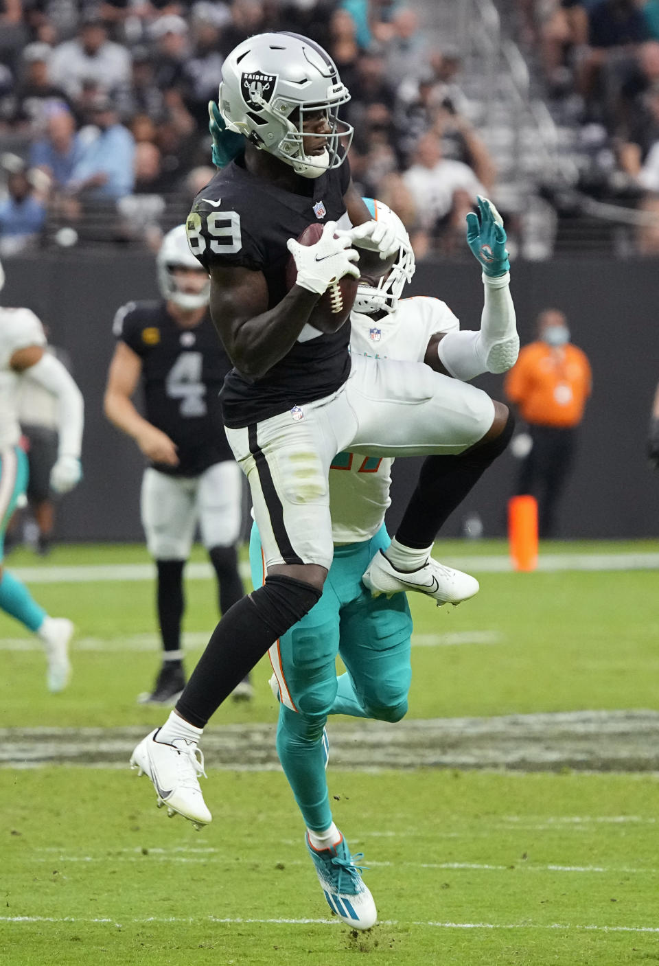 Las Vegas Raiders wide receiver Bryan Edwards (89) makes a catch against the Miami Dolphins during overtime of an NFL football game, Sunday, Sept. 26, 2021, in Las Vegas. (AP Photo/Rick Scuteri)