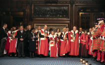 Members of the House of Lords watch as Yeoman warders take part in the traditional Ceremonial Search ceremony ahead of the official State Opening of Parliament in London, Monday Oct. 14, 2019. (Richard Pohle/Pool via AP)