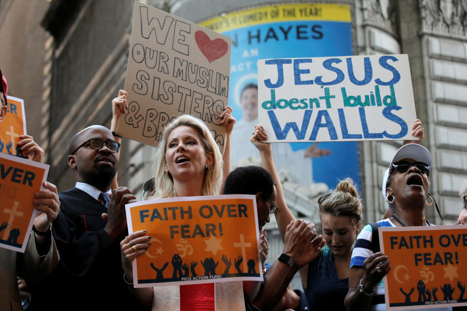 A group of interfaith religious leaders protests against then-presidential candidate Donald Trump outside a hotel where he met with evangelical leaders in New York City on June 21, 2016. (Photo: Brendan McDermid / Reuters)