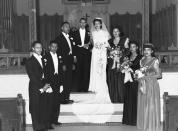 <p>Most brides shied away from having their bridesmaids wearing white by the 1940s. Instead, high-waisted gowns with full, structured shoulders took over.</p>