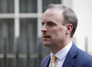 Britain's Secretary of State for Foreign Affairs, Dominic Raab, left, leaves 10 Downing Street after a meeting as British Prime Minister Boris Johnson was moved to intensive care after his coronavirus symptoms worsened in London, Tuesday, April 7, 2020. Johnson was admitted to St Thomas' hospital in central London on Sunday after his coronavirus symptoms persisted for 10 days. Having been in hospital for tests and observation, his doctors advised that he be admitted to intensive care on Monday evening. The new coronavirus causes mild or moderate symptoms for most people, but for some, especially older adults and people with existing health problems, it can cause more severe illness or death.(AP Photo/Matt Dunham)