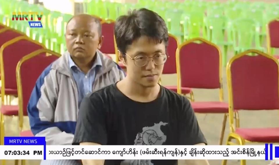 In this image taken from video by Myanmar state broadcaster MRTV, Japanese national Toru Kubota is shown seated during a ceremony inside the Insein prison in Yangon, Myanmar on Thursday, Nov. 17, 2022. Myanmar’s military-controlled government says it is releasing and deporting an Australian academic, a Japanese filmmaker, an ex-British diplomat and an American as part of a broad prisoner amnesty marking the country’s National Victory Day. (MRTV via AP)