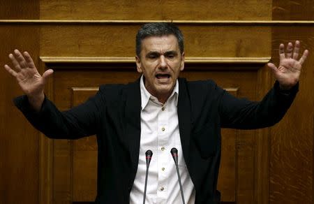 Greek Finance Minister Euclid Tsakalotos addresses lawmakers during a parliamentary session in Athens, Greece July 22, 2015. REUTERS/Yiannis Kourtoglou