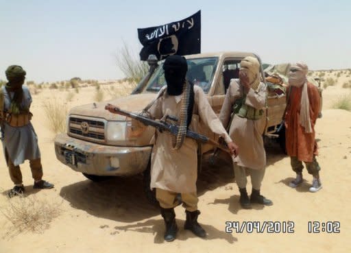 Islamist rebels of Ansar Dine are pictured near Timbuktu, in rebel-held northern Mali on April 24. A newly formed group of armed Arab fighters tightened its grip on the northern Malian desert city of Timbuktu on Friday, witnesses said