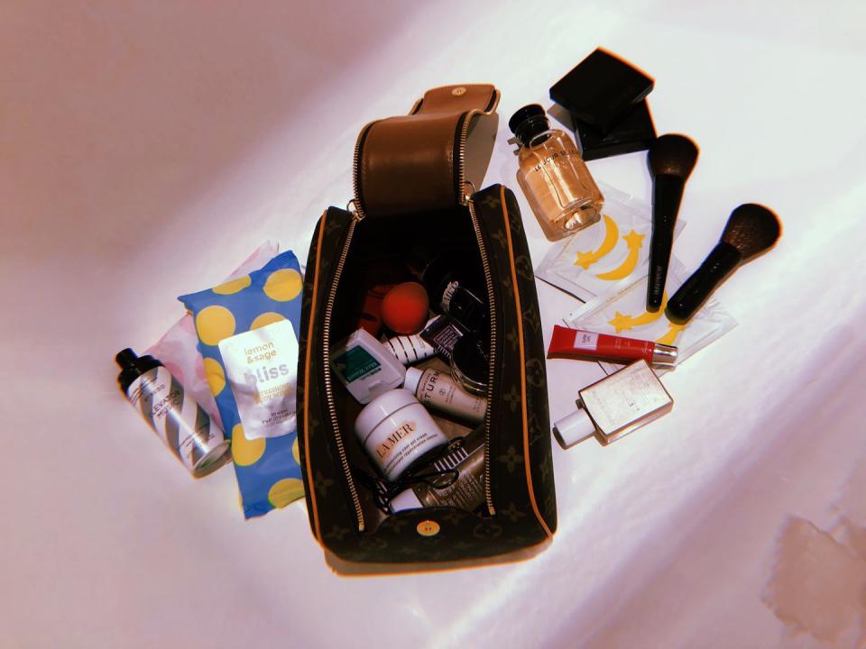 <p>Some more of my beauty bag: <a rel="nofollow noopener" href="https://byredo.com/elevator-music-hair-perfume-75-ml" target="_blank" data-ylk="slk:Byredo x Off White Elevator Music Perfume;elm:context_link;itc:0;sec:content-canvas" class="link ">Byredo x Off White Elevator Music Perfume</a>, <a rel="nofollow noopener" href="https://www.blissworld.com/lemon-sage-refreshing-body-wipes/" target="_blank" data-ylk="slk:Bliss Lemon & Sage Refreshing Body Wipes;elm:context_link;itc:0;sec:content-canvas" class="link ">Bliss Lemon & Sage Refreshing Body Wipes</a>, <a rel="nofollow noopener" href="https://www.sephora.com/product/the-moisturizing-cool-gel-cream-P429637" target="_blank" data-ylk="slk:La Mer The Moisturizing Cool Gel Cream;elm:context_link;itc:0;sec:content-canvas" class="link ">La Mer The Moisturizing Cool Gel Cream</a>, <a rel="nofollow noopener" href="https://www.neimanmarcus.com/Dr-Barbara-Sturm-Glow-Drops/prod211200012/p.prod?ecid=NMCS__GooglePLA&utm_source=google_shopping&adpos=1o3&scid=scplpsku179290132&sc_intid=sku179290132&gclid=CjwKCAjwo87YBRBgEiwAI1LkqUqA9rvVrvY-F8j90826OoJ9xLwNHg0zcs1IrHq406DrvOcyHTdisxoCzgsQAvD_BwE" target="_blank" data-ylk="slk:Dr. Barbara Sturm Glow Drops;elm:context_link;itc:0;sec:content-canvas" class="link ">Dr. Barbara Sturm Glow Drops</a></p>