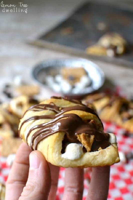 <p>Lemon Tree Dwelling</p><p>S'mores Crescent Rolls stuffed with chocolate chips, marshmallows, graham crackers and Nutella and topped with Nutella drizzle. Our favorite new way to enjoy s'mores!</p><p><strong>Get the recipe: <a href="https://www.lemontreedwelling.com/smores-crescent-rolls/" rel="nofollow noopener" target="_blank" data-ylk="slk:S'mores Crescent Rolls;elm:context_link;itc:0;sec:content-canvas" class="link ">S'mores Crescent Rolls</a></strong></p>