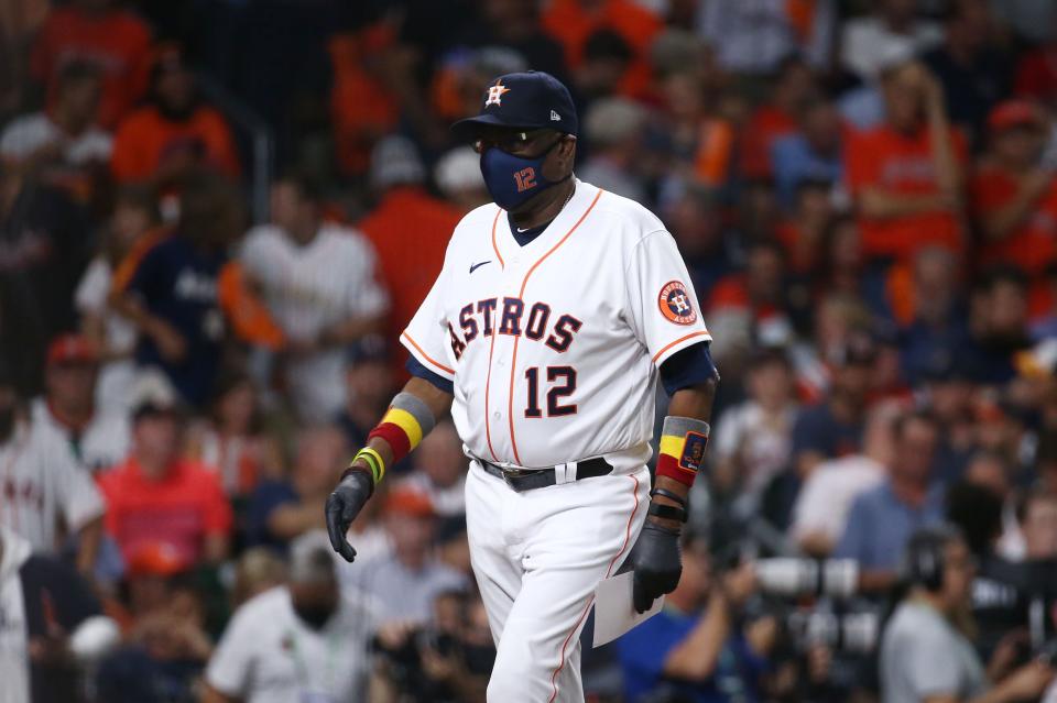 Astros manager Dusty Baker with his unique wristbands.