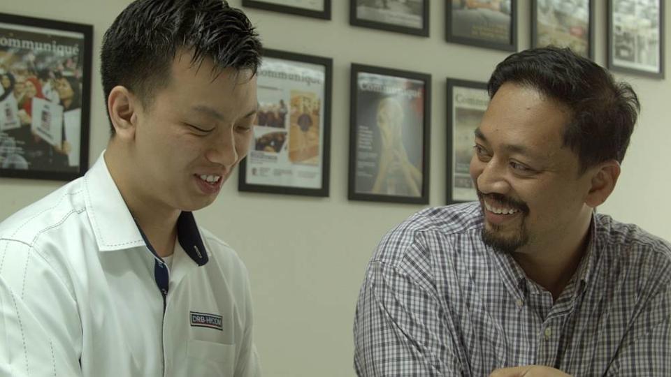 Mohamad (right) says that Lee’s cheerful disposition make his transition into the company an easy one. — Picture courtesy of DRB-Hicom